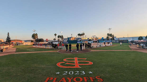 The San Jose Giants (SF Giants Single-A affiliate) and Modesto Nuts stand on the field prior to Game 2 of the California League  Playoffs on September 15, 2023.